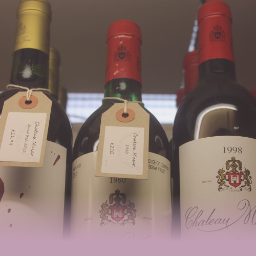 Close up of three wine bottles