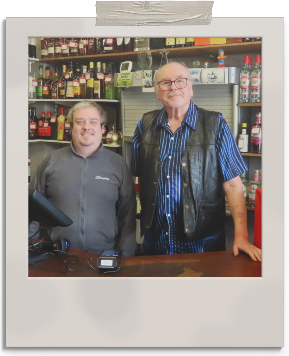 Phil and Dave inside the shop
